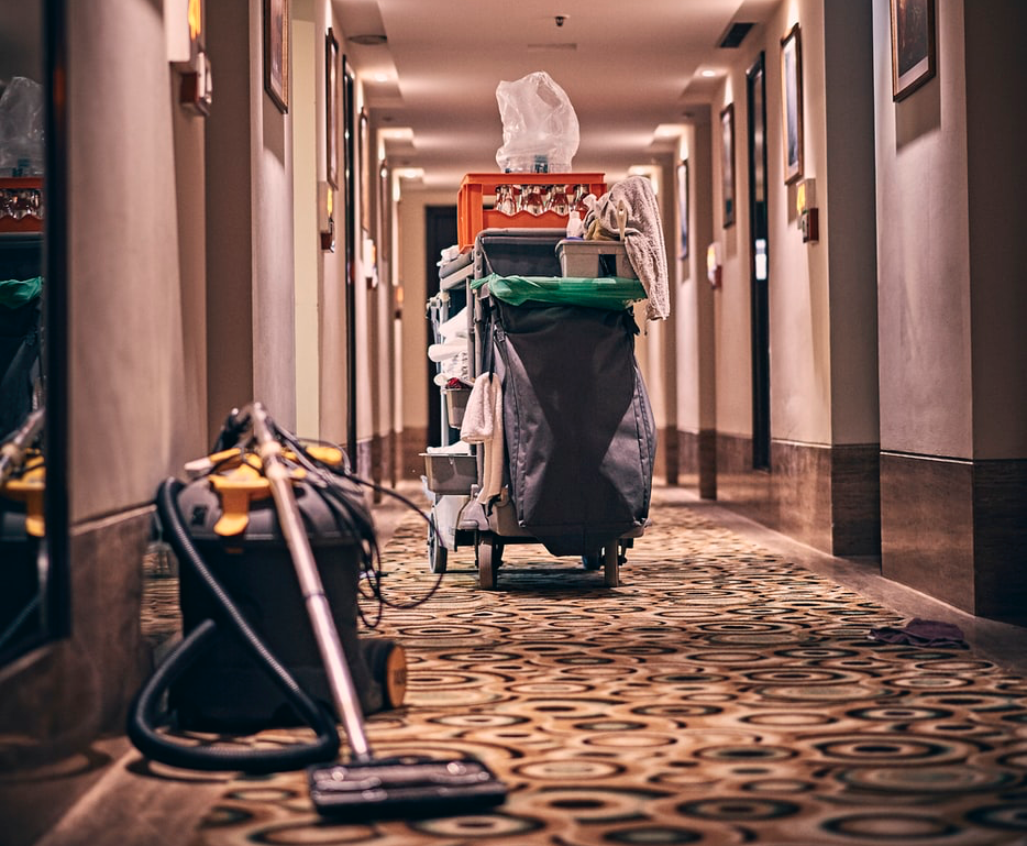 cleaning supplies in a hotel hallway